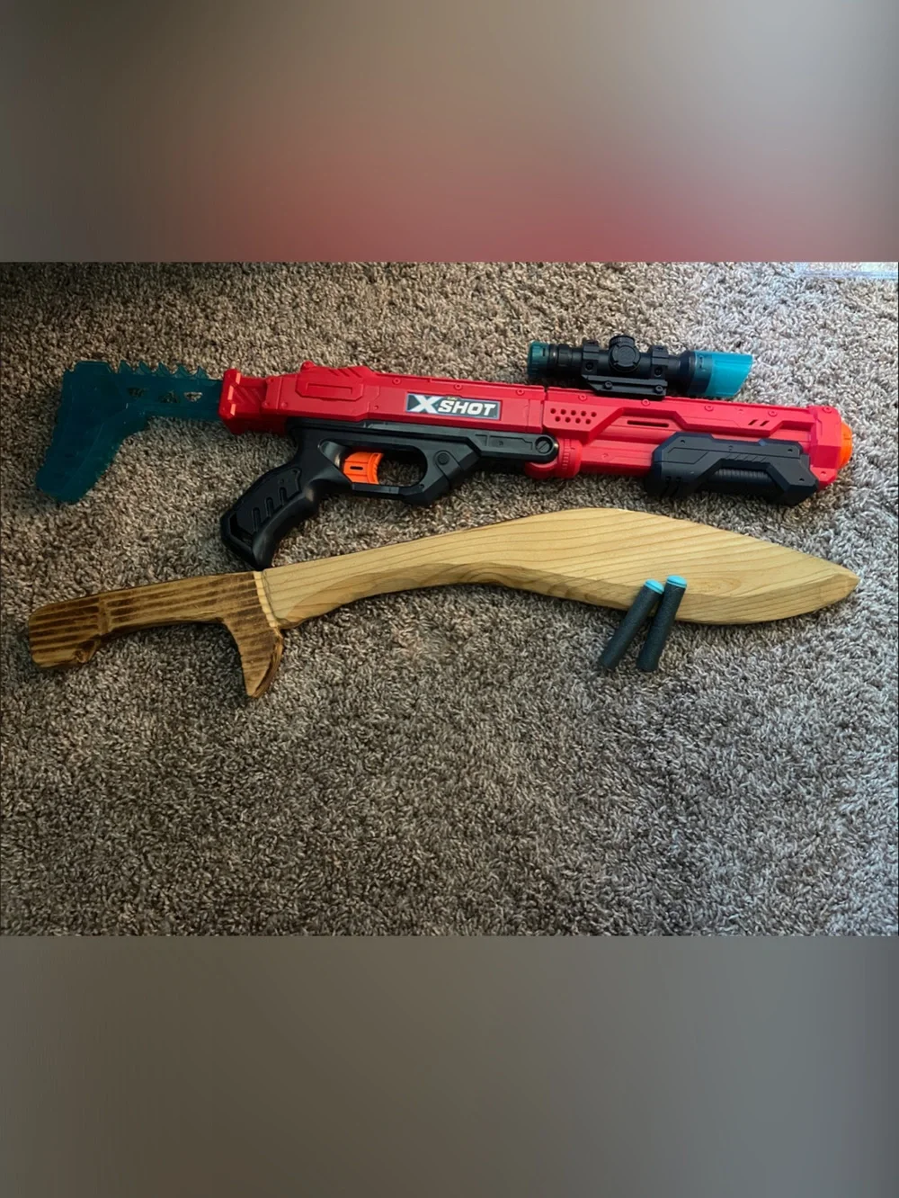 Nerf Red and Black Foam Dart Blaster with Teal Scope and Wooden Toy Sword